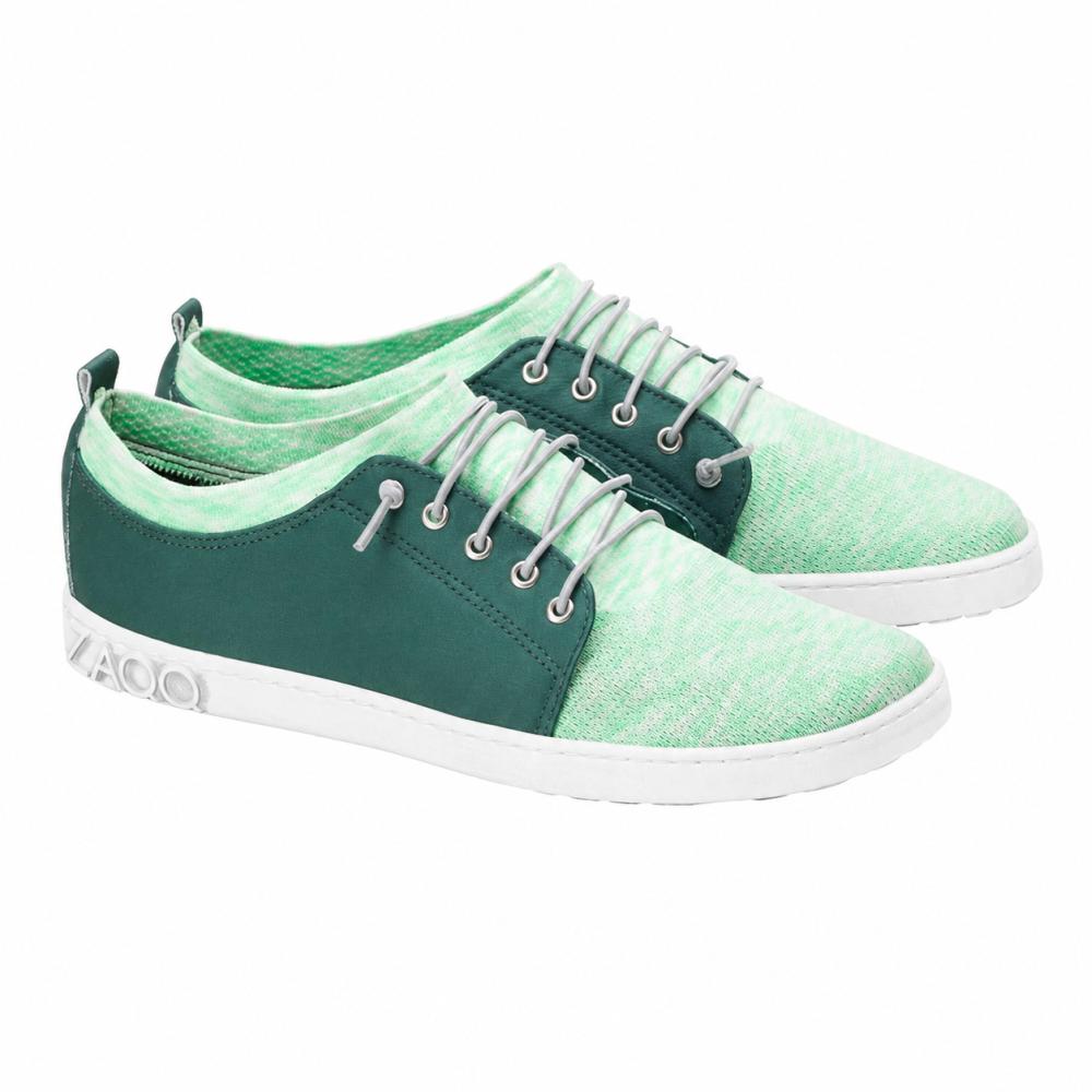 Presentamos las zapatillas QRIS Green Sneaker de ZAQQ: un elegante par de zapatos casuales verde menta con suela blanca, acentos verde oscuro y cordones blancos. Estas zapatillas se destacan por su diseño moderno y deportivo, siendo ideales para cualquier aventura.